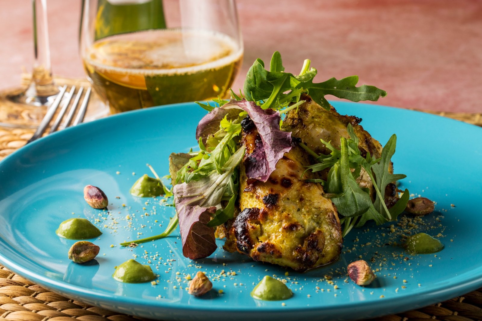 Chef-prepared Indian dish on a blue plate